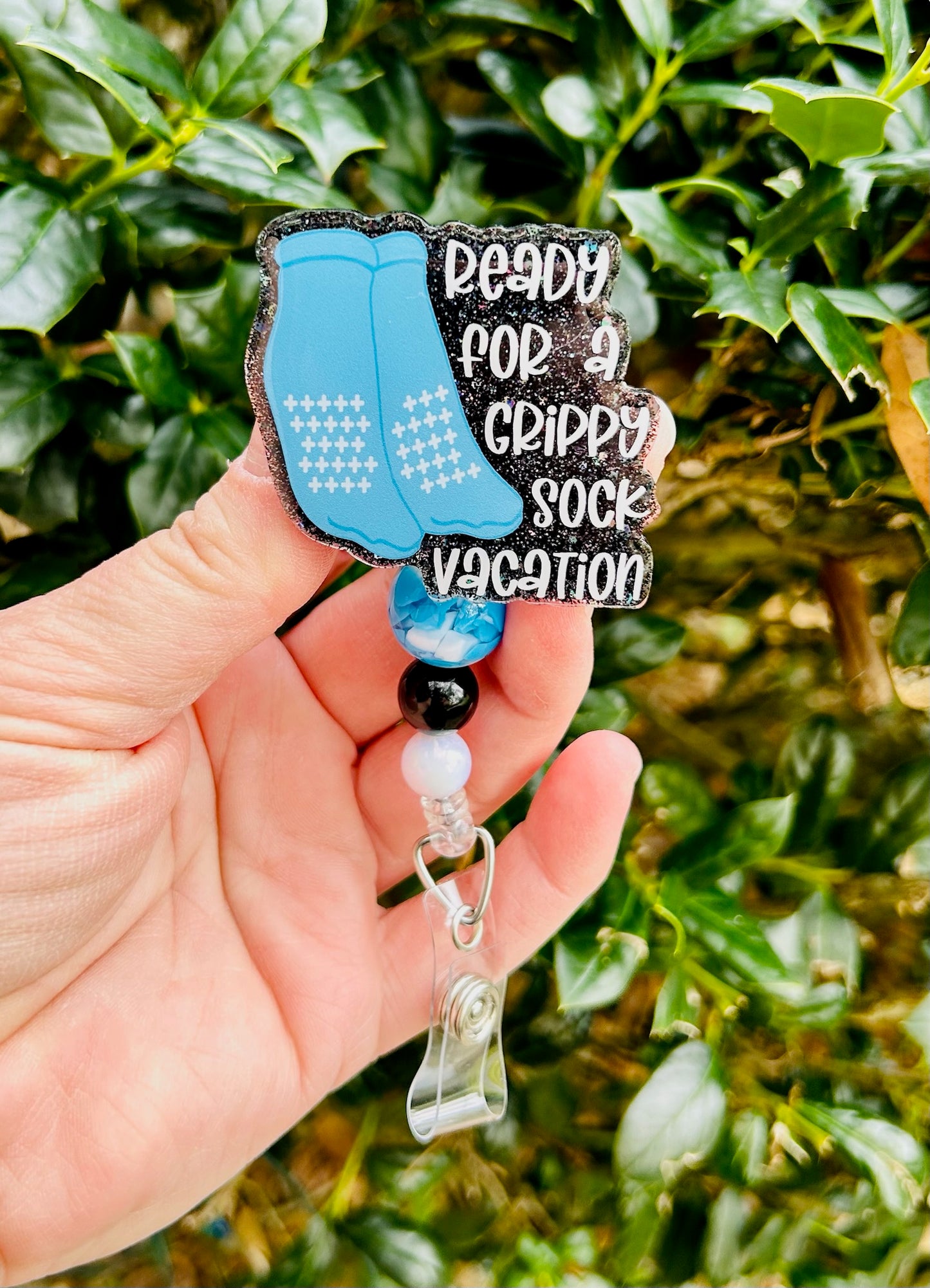 Time for a Grippy Sock Vacation Badge Reel