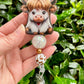 Baby Highland Cow Badge Reel