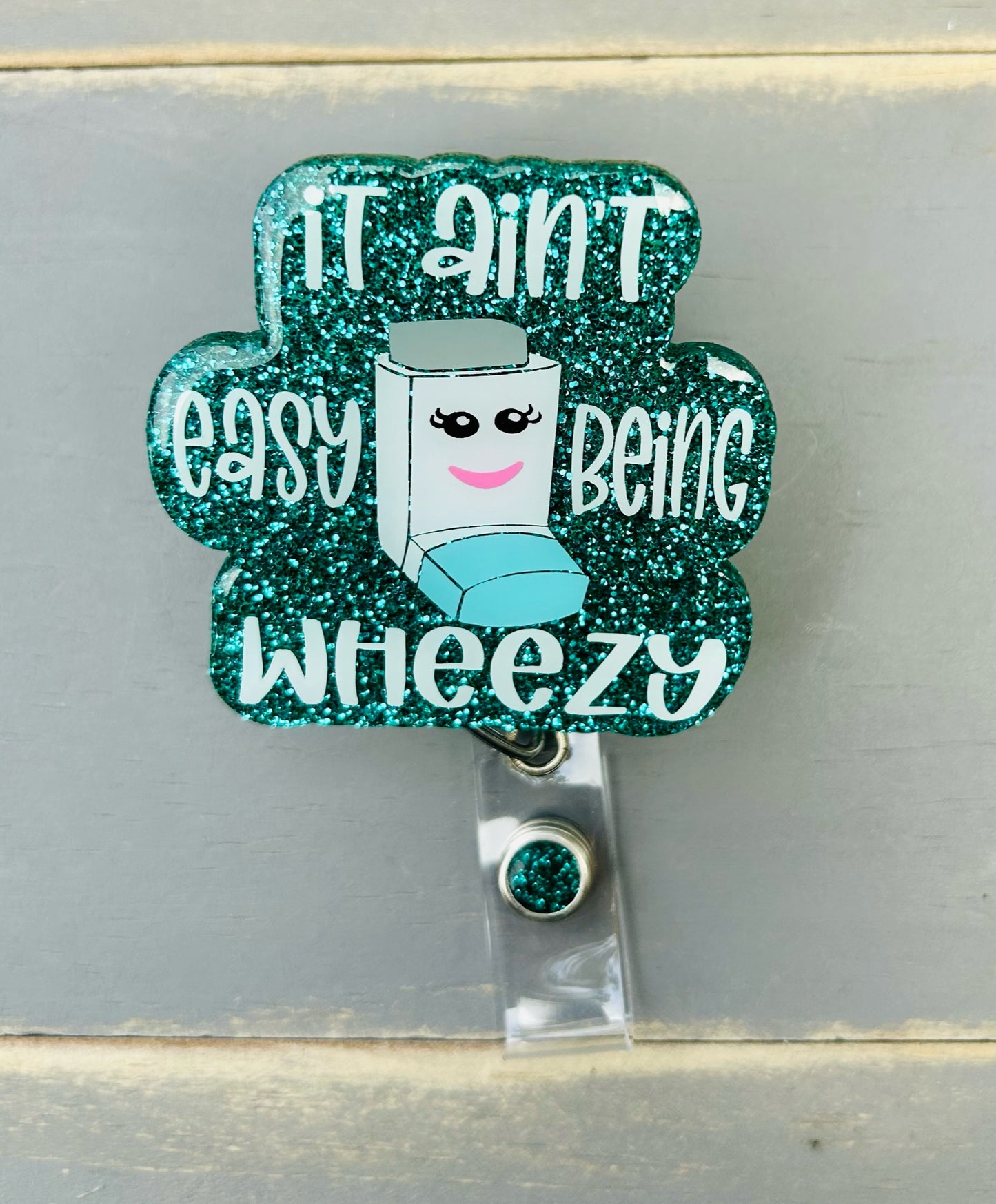 It Ain’t Easy Being Wheezy Badge Reel