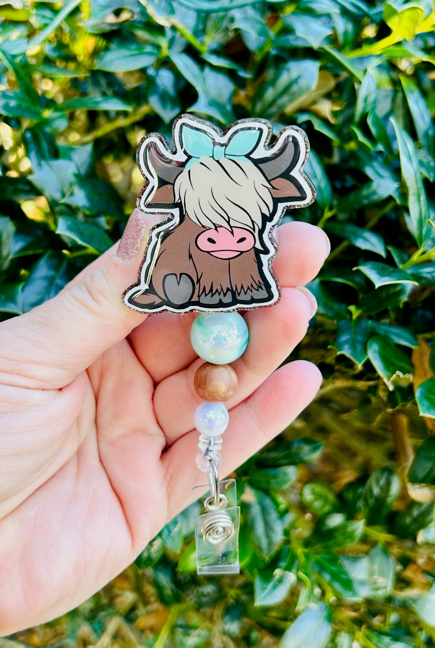 Highland Cow with Bow Badge Reel